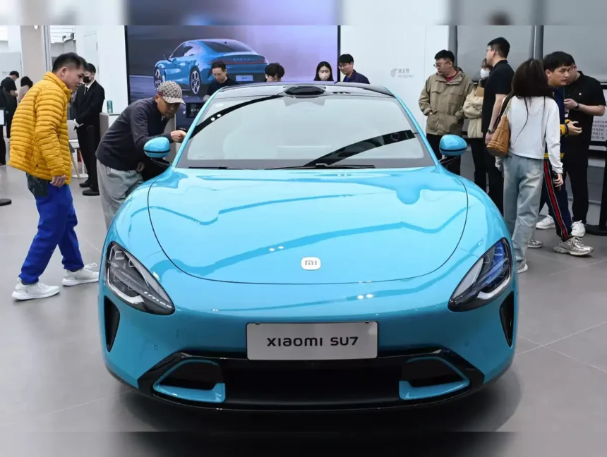 Xiaomi’s First Electric Car Sparks Demand, Delays Deliveries